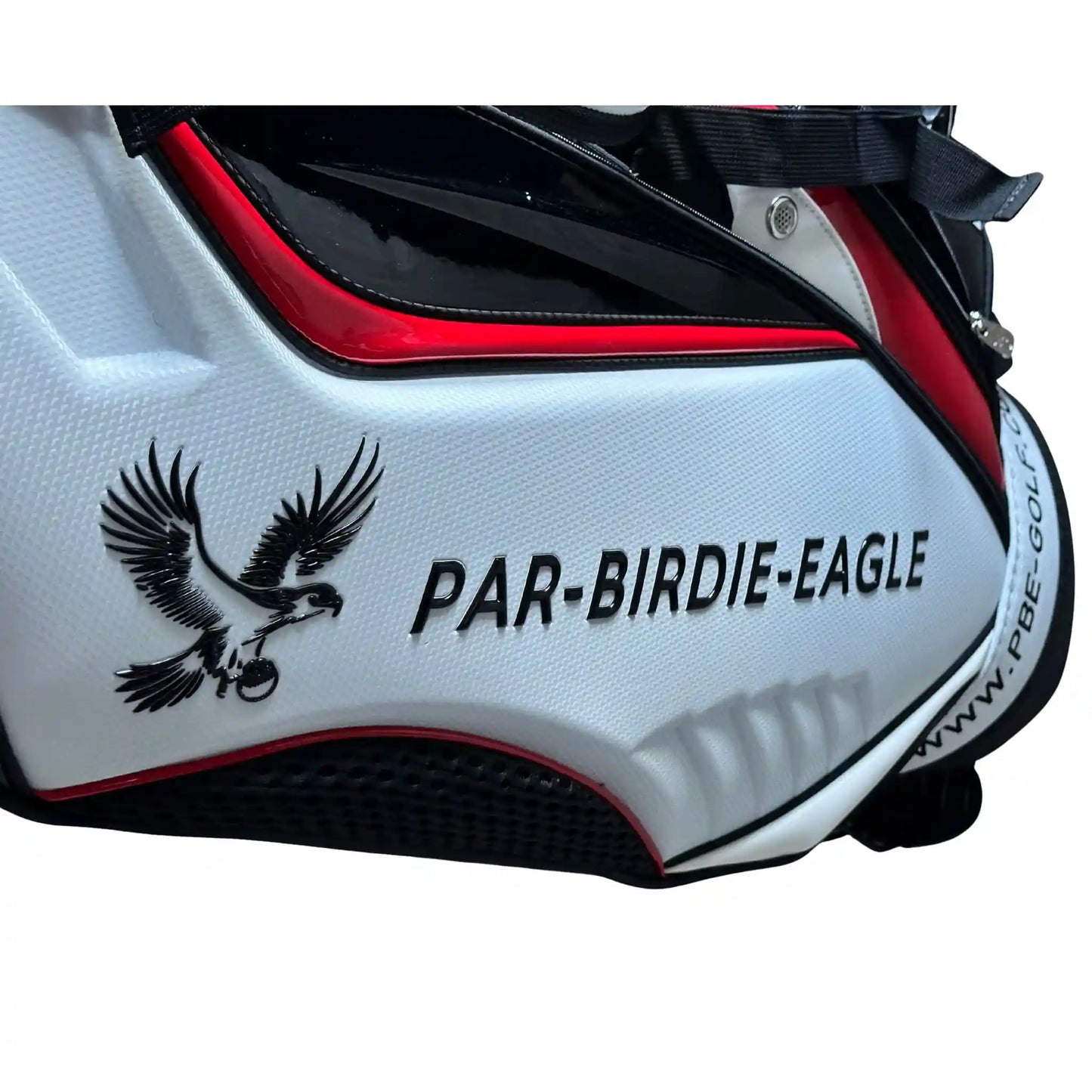 Close-up of a white golf bag with black eagle design and 'PAR-BIRDIE-EAGLE' text on a white background