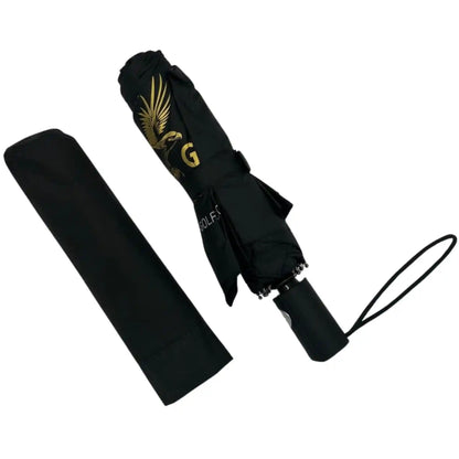 Black umbrella with gold logo and matching black case on a white background