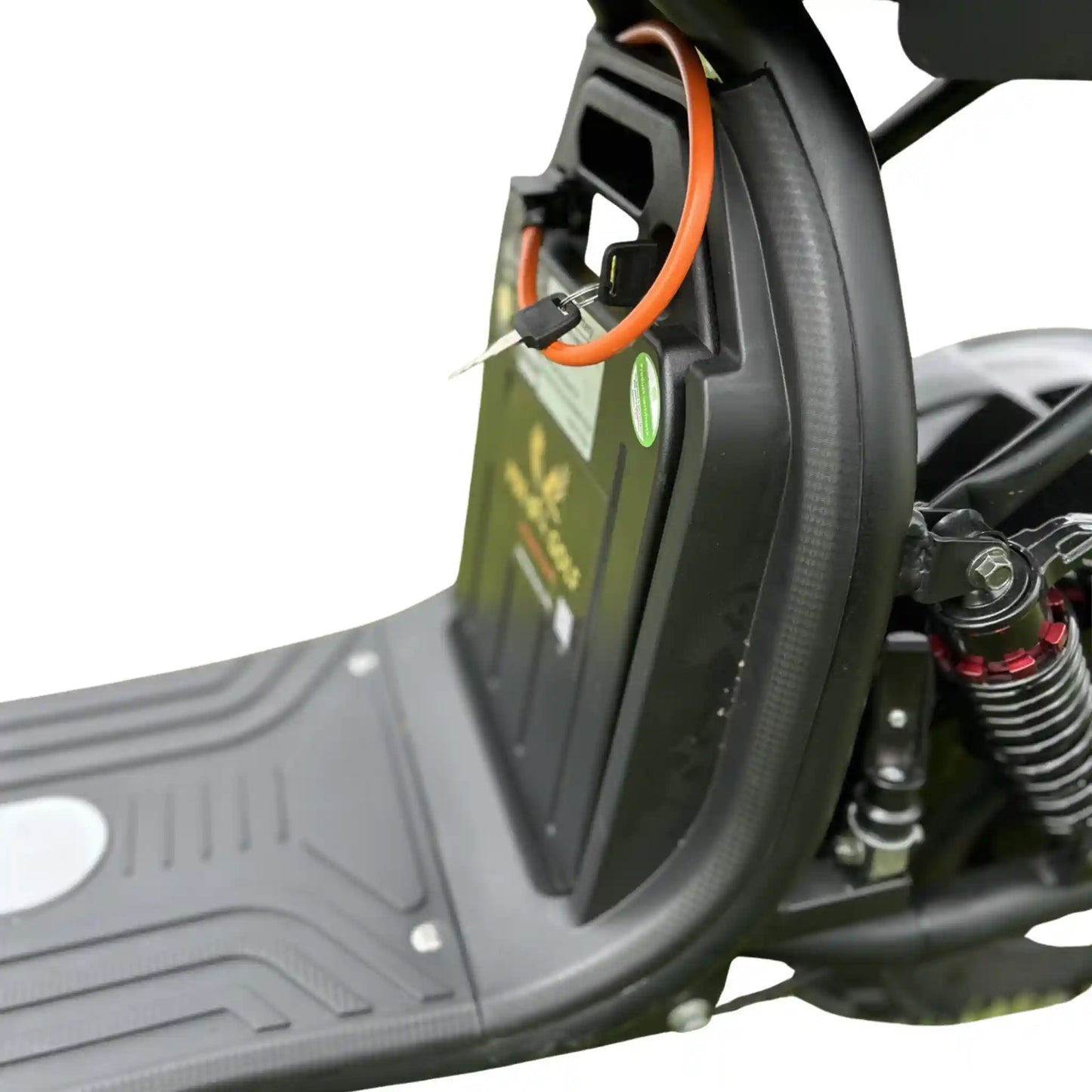 Close-up of a motorcycle seat with a visible brand logo on a white background, showing a removable and lockable lithium battery