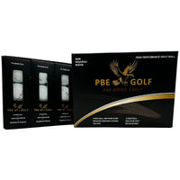 PBE Golf packaging with golf balls inside on a white background
