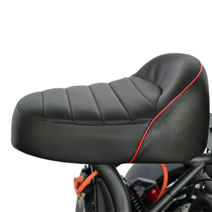 Black motorcycle seat with red stitching on a white background