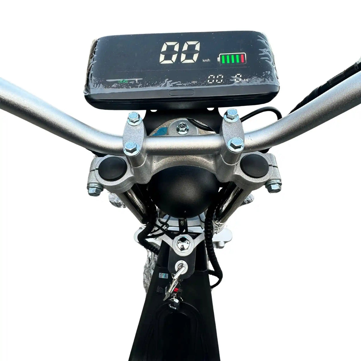 Close-up of a motorcycle handlebar with a digital display on a white background