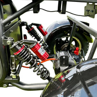 Close-up of a motorcycle suspension system with springs and shock absorbers.